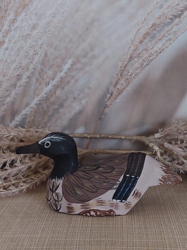 Klein houten lokeendje