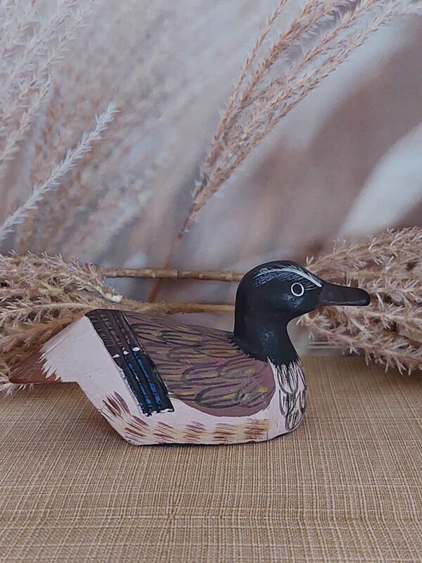 Klein houten lokeendje