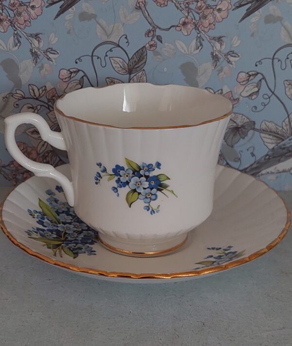 Kop en schotel Vergeet-mij-nietjes