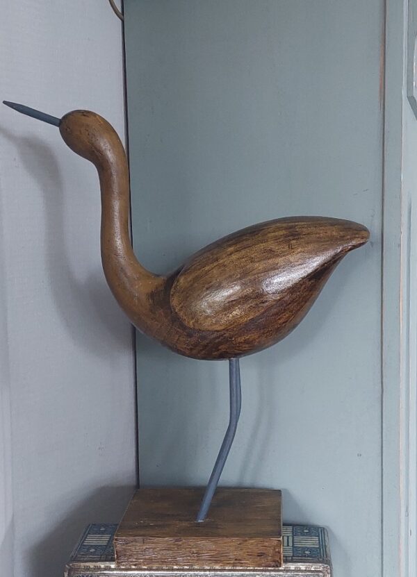 Houten vogel sculpture