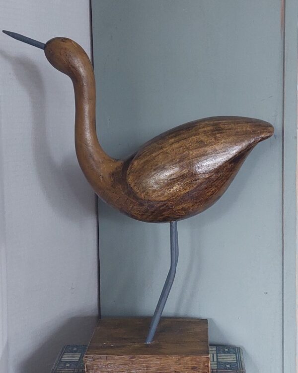Houten vogel sculpture