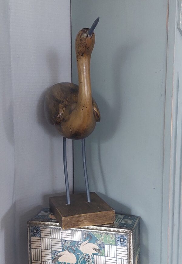 Houten vogel sculpture