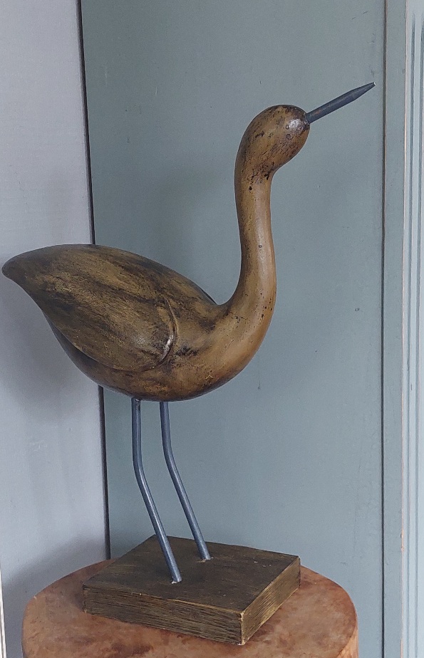 Houten vogel sculpture