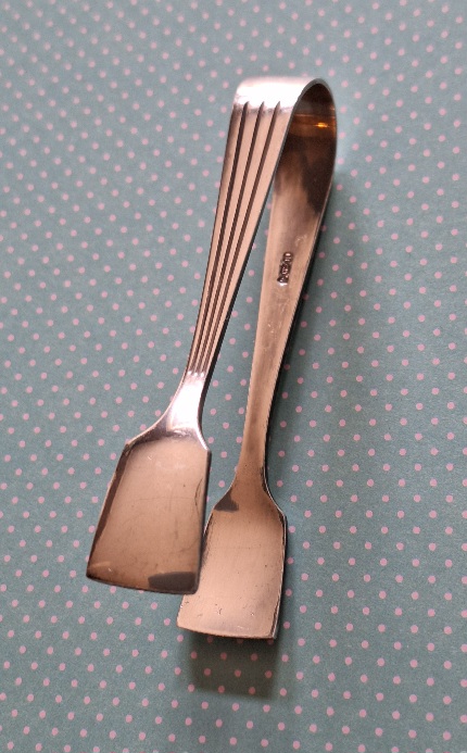 Verzilverde Suikertang Douwe Egberts